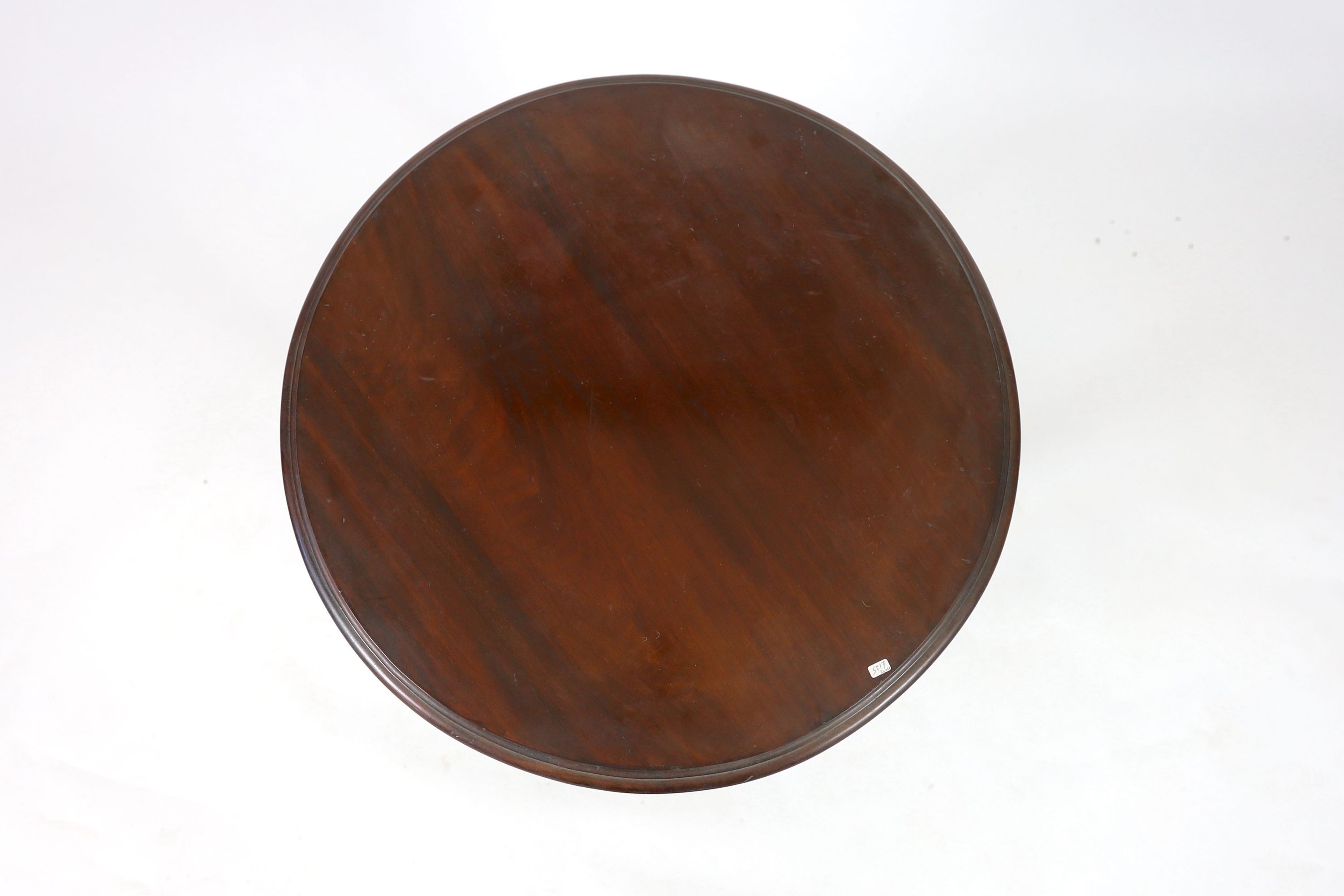 An Edwardian circular mahogany centre table, diameter 60cm hieght 72cm